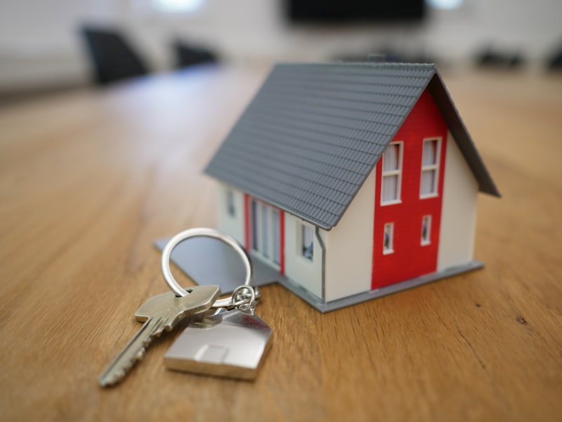 A homeowner meeting a local real estate agent